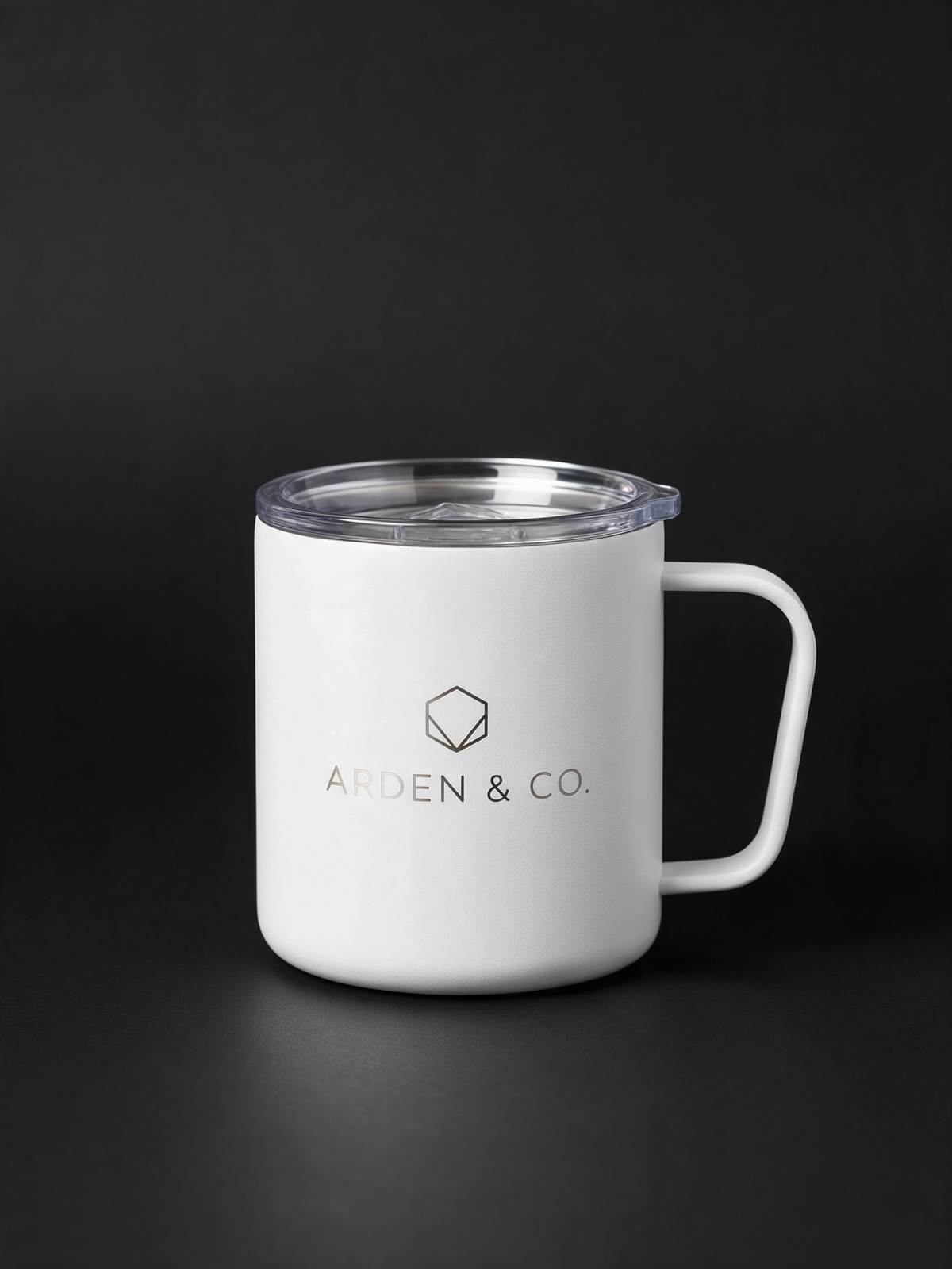 white 12oz camper mug laser engraved with a logo