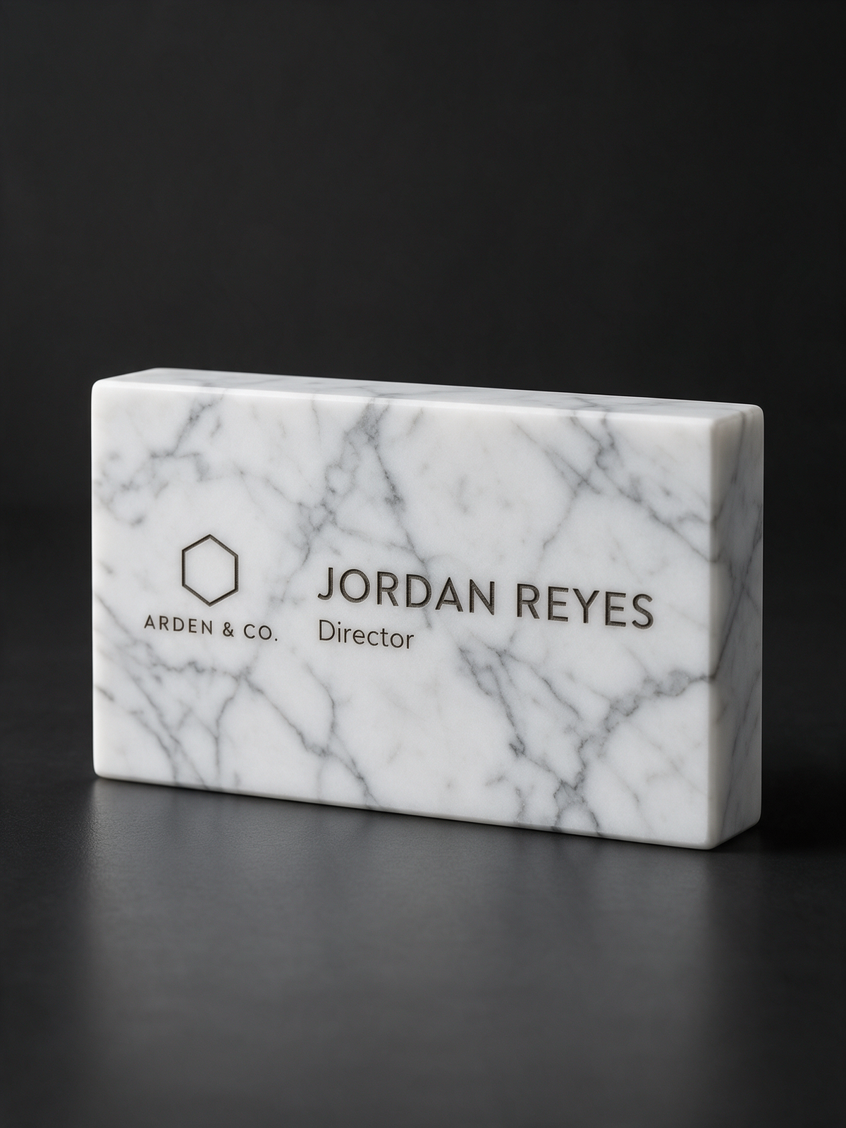 marble desk name plate laser engraved with a logo and name