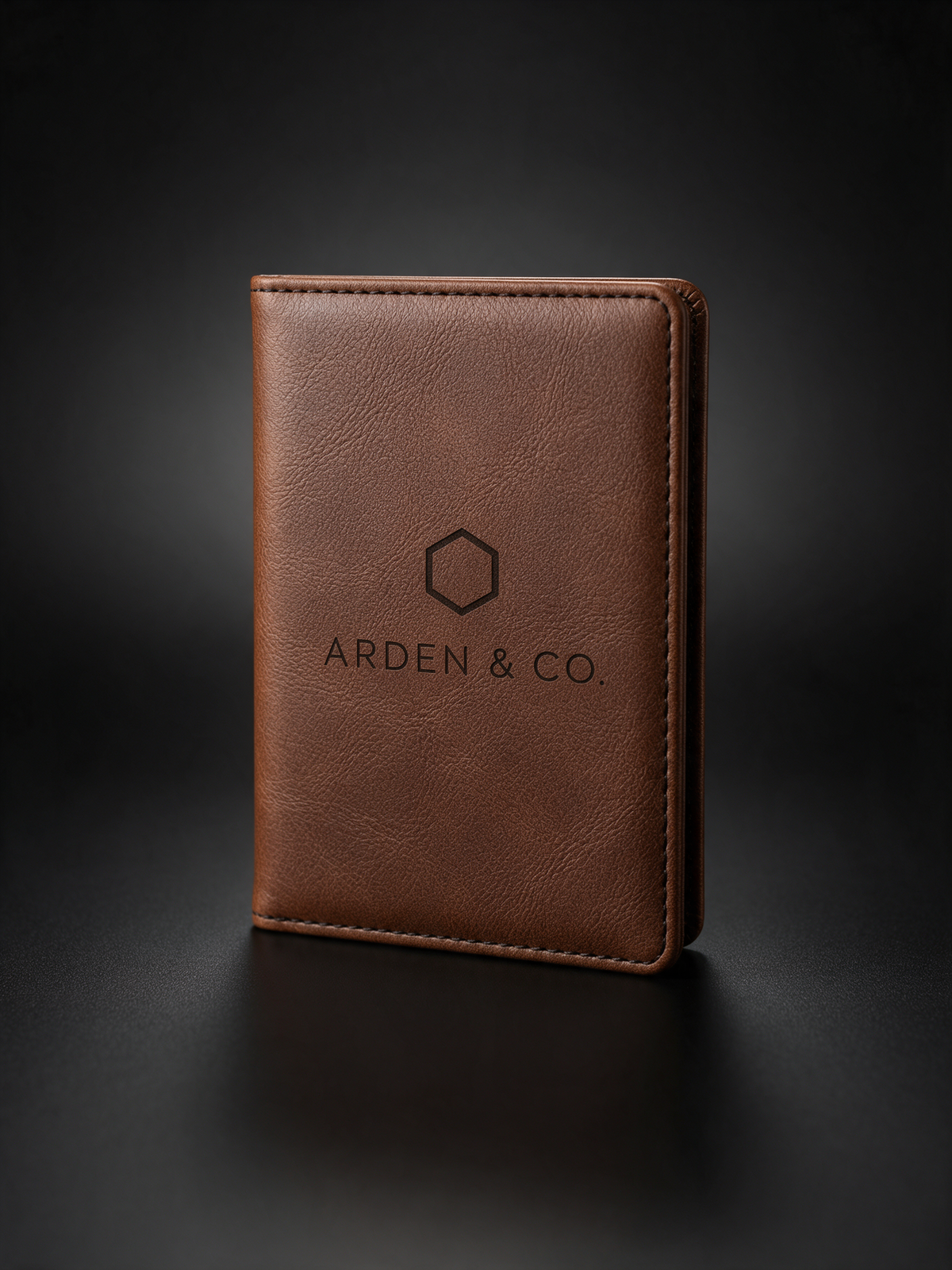 brown leatherette passport wallet laser engraved with a logo