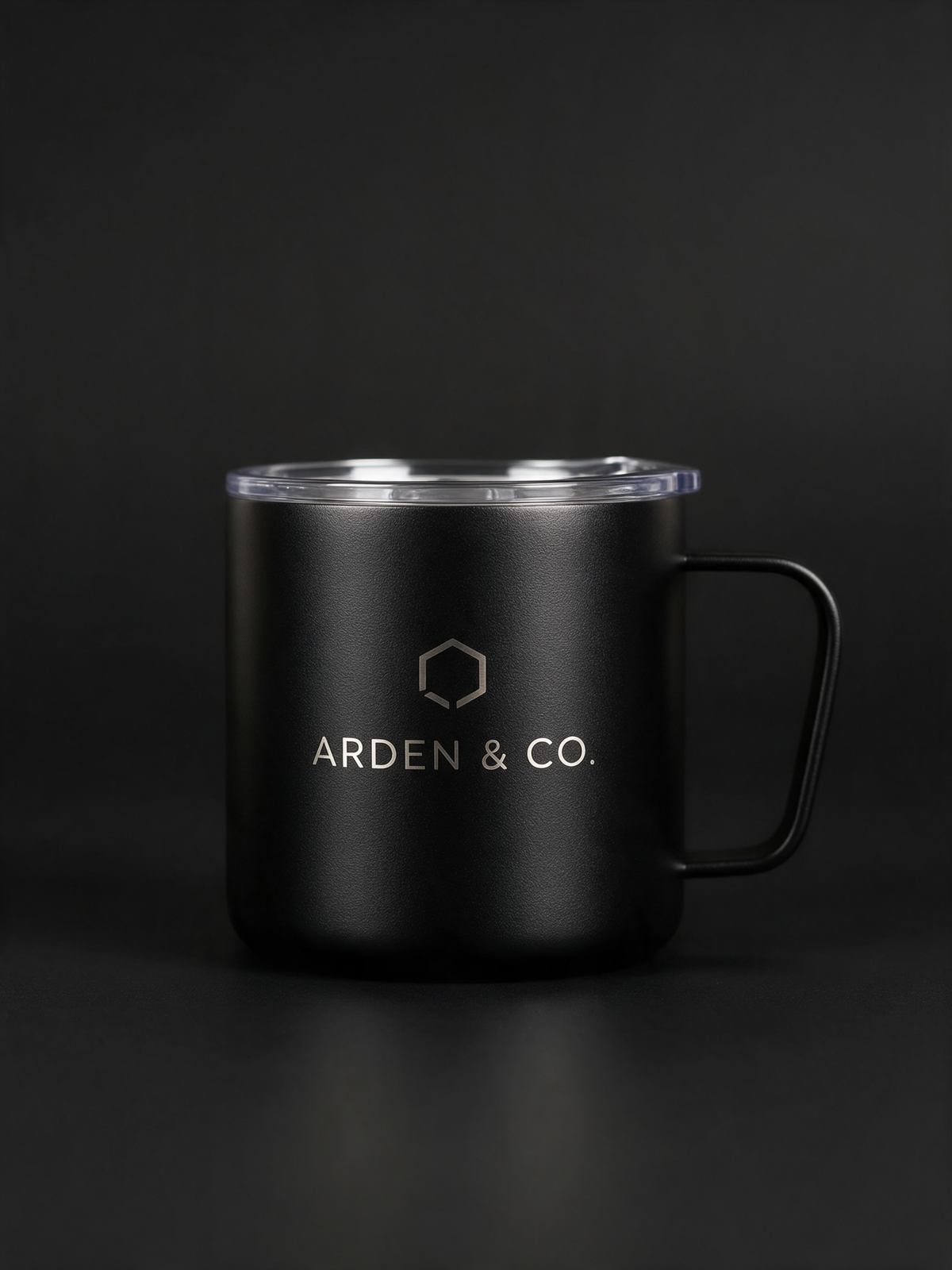 black 12oz camper mug laser engraved with a logo
