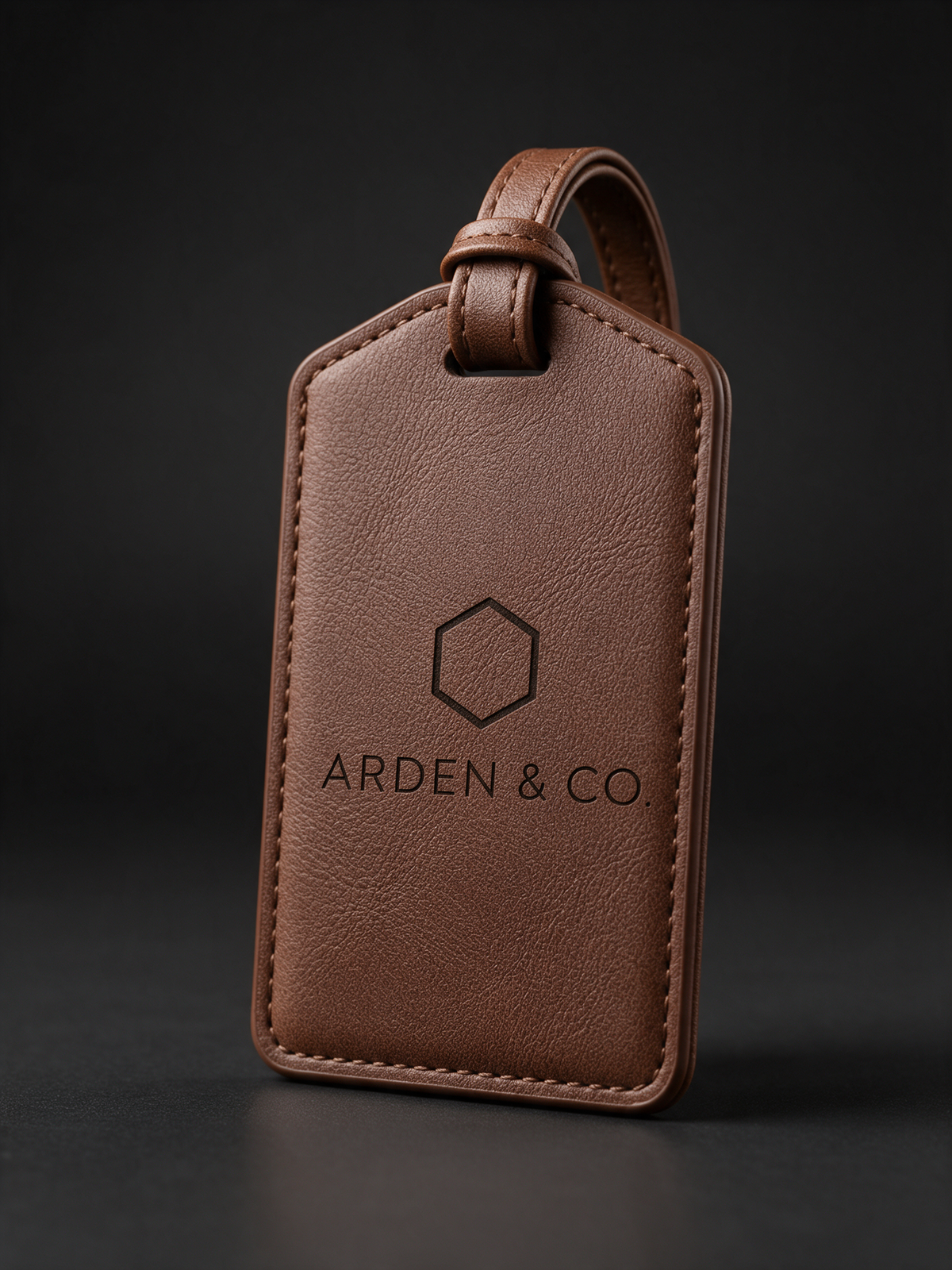 brown leatherette luggage tag laser engraved with a logo