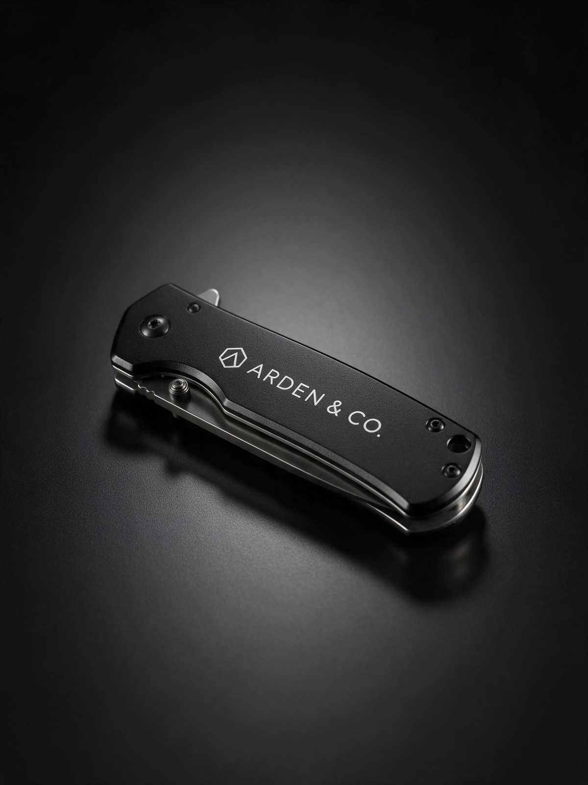 black aluminum pocket knife laser engraved with a logo