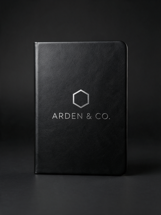 black leatherette journal laser engraved with a logo