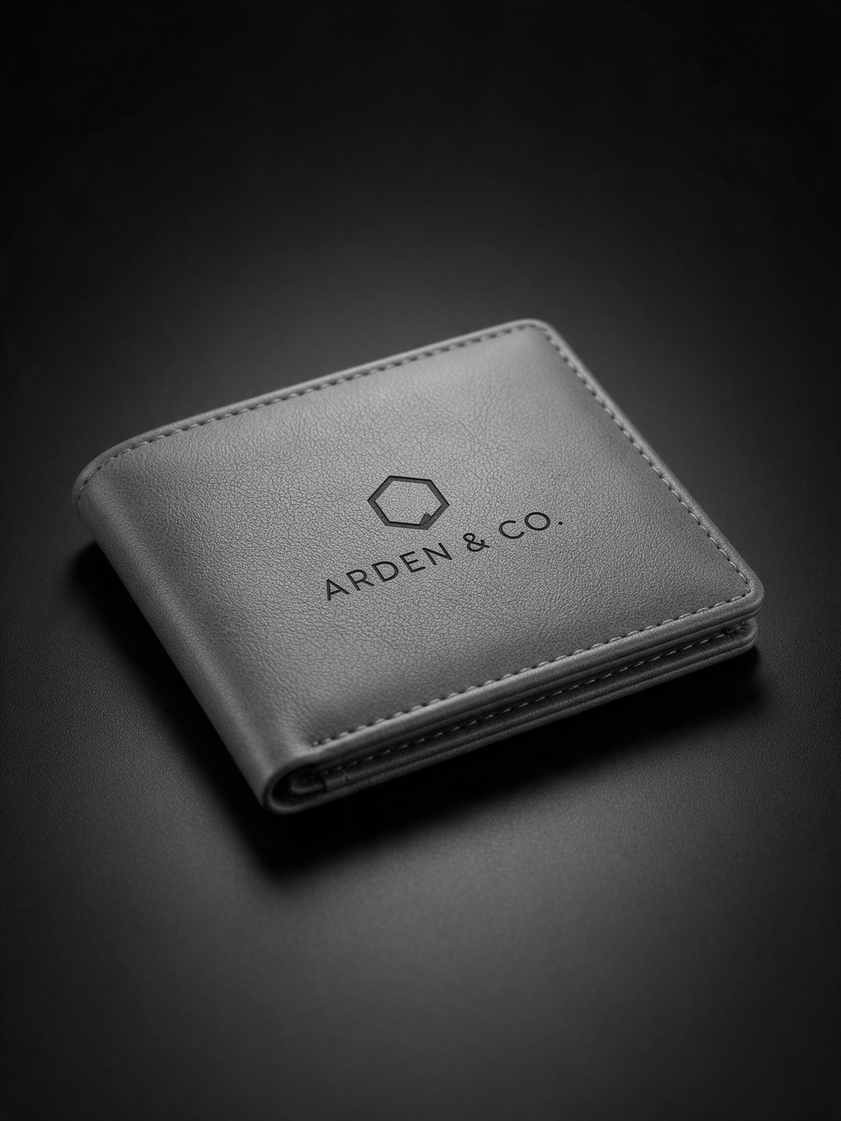 gray leatherette bifold wallet laser engraved with a logo