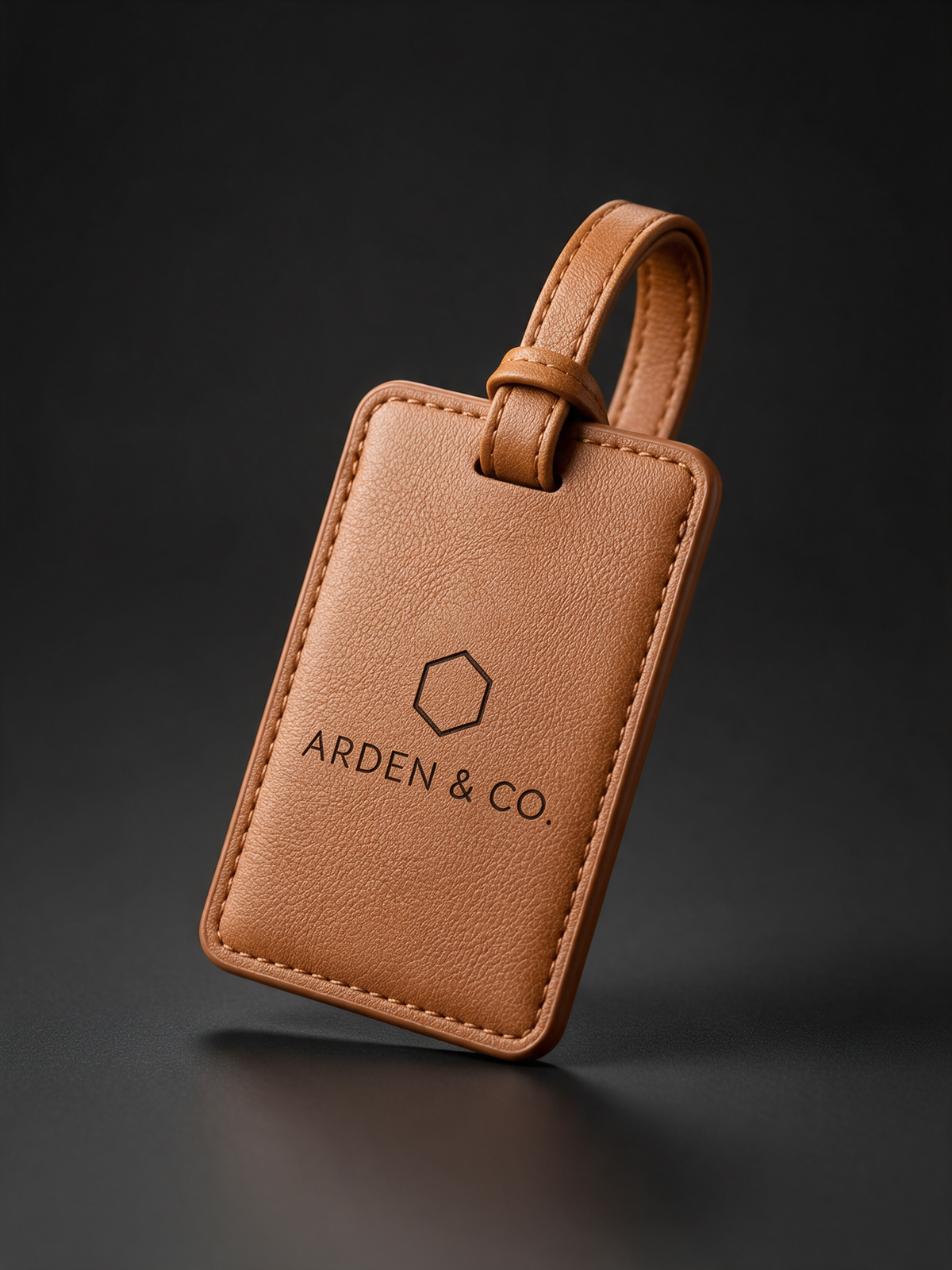 rawhide leatherette luggage tag laser engraved with a logo