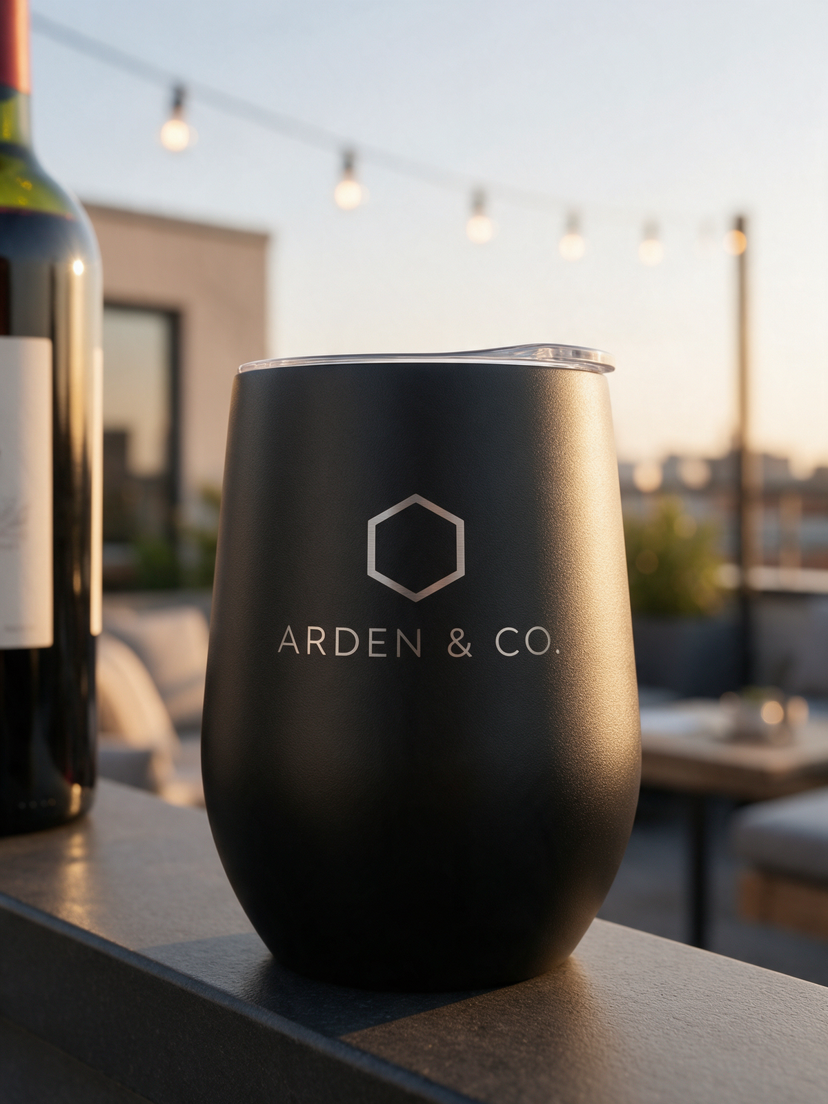 engraved wine tumbler on a rooftop terrace