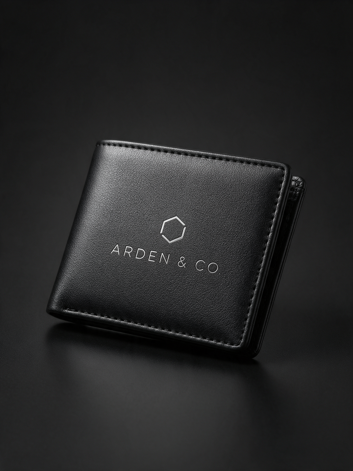 black leatherette bifold wallet laser engraved with a logo