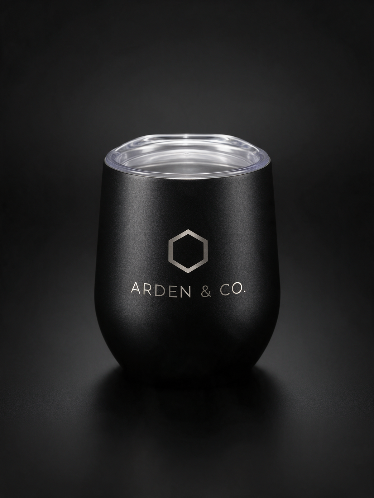 black 12oz wine tumbler laser engraved with a logo